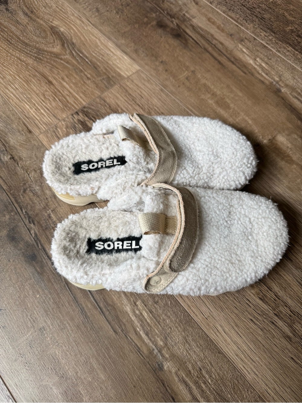 Sorel Woman’s Cream Fuzzy Slip-On Clogs with Tan Strap